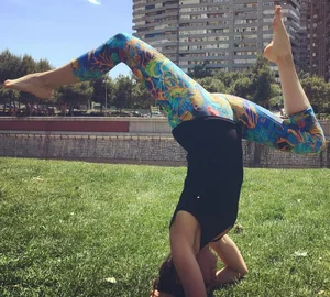 Hot Chick in Colorful Tights doing Yoga with Bare Feet