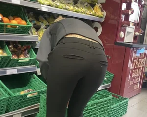 Milf bending over wearing pink thong VPL