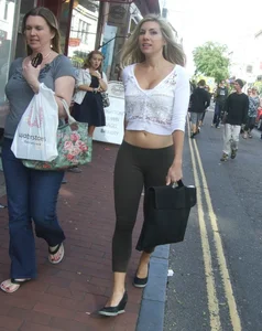 Sexy blonde out walking in green leggings with vpl