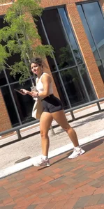 Curly Campus Brunette with amazing Bubble Butt in Tight Shorts (oc)