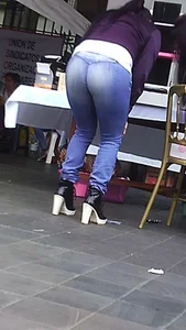 Big booty Latina lady in tight jeans with a round ass