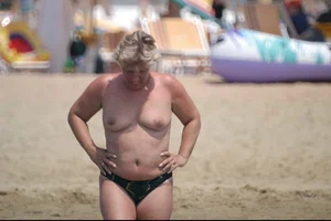 Girls on a nude beach in Bibione, Italy
