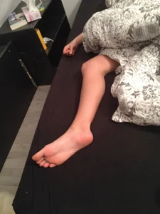 Foot of a Girl Sleeping Under the Blanket Home Creepshot