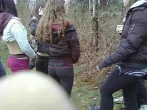 Slender Candid Teen Girl With Curly Hair in Leggings Nature Park Photo