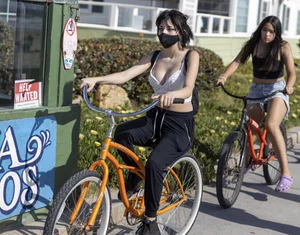 Increadibly hot busty bike girl weaeing a mask street creepshot