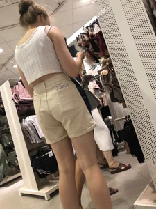 Cute candid teen in a top and shorts creepshots