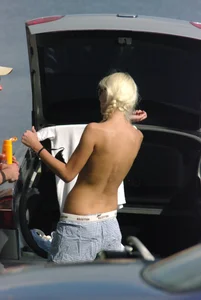 Blonde babe changing into and out of bikini and shows her tits