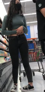 Tight green top and blk jeans at the market