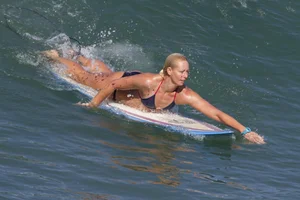 Candid surfer babes on the beach and in bikinis