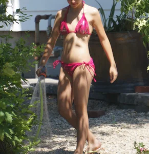 A hot teen neighbor in various bikinis