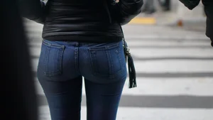 Brunette lady in tight jeans with a great ass