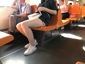 Amazing Hot Girl Sitting in the Train in Shorts Showing Off Her Gorgeous Legs Candid Gallery