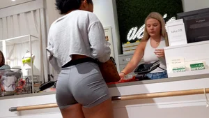 Candid ebony babe with an amazing ass and vpl in grey Nike spandex shorts