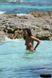 Nude beach ladies in the water showing their tits