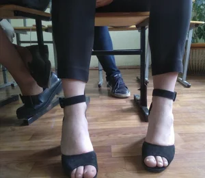 Under Desk Feet Pic of a College Teen in High-Heeled Sandals