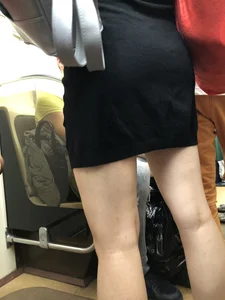 Girl with Hot Ass and Legs with Pale Skin in a Dress Standing in a Subway Train Candid Closeup