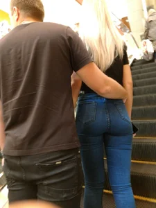 Blonde with a Nice Booty in Jeans with Her Boyfriend on the Mall Escalator Creepshots