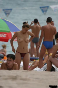 Beach voyeur girls in bikinis, thongs and topless