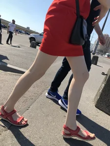 Girl in a Red Dress and Sandals With Thin, Pale Legs on the Crosswalk City Creepshots Gallery