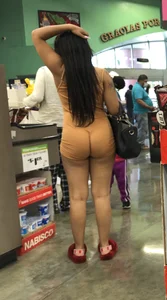 Latina with hard nipples and a big booty in tight spandex shorts outfit