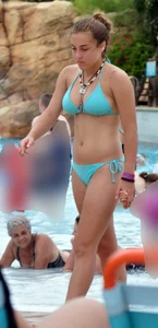 Cute girl with nice body in her teal bikini in Florida