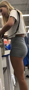 Doll faced beauty in tight gray cotton shorts