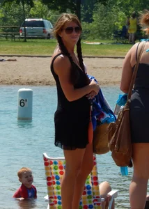 Lady with nice tits in a white bikini on the beach