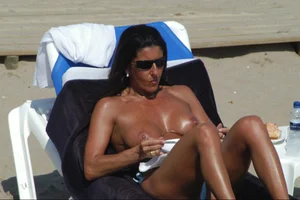 Girls on a nude beach in Sitges, Spain