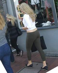 Sexy blonde out walking in green leggings with vpl
