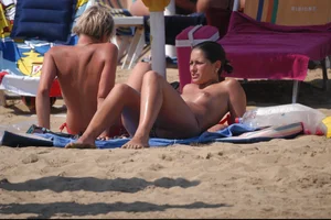 Girls on a nude beach in Bibione, Italy
