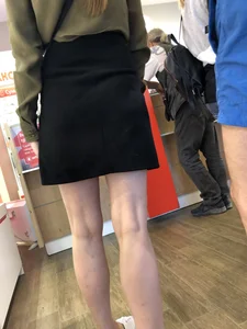 Girl with Pale Skinny Legs in a Skirt Candid