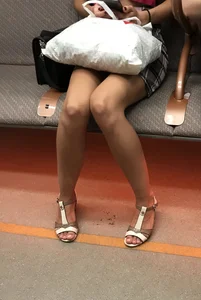 Hot Slim Legs of a Candid Girl in High-Heeled Sandals Subway Train Creepshot