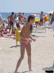 Beach voyeur girls in bikinis, thongs and topless