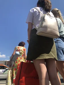 Hot girl in short dresses and skirts on the crosswalk street creepshots