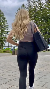 Blonde College Girl In Leggings Girl Keeps Touching Her Booty