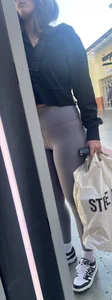 Sexy girl in grey leggings showing ass and cameltoe