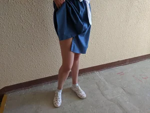 Girl in a Blue Dress Flashing Legs and Panties