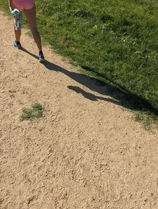 Fit asian chick running in tight pink shorts