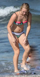 Sexy beach blonde snorkeling in bikini