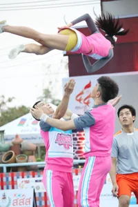 Bunch of athletic Thai cheerleaders at a competition