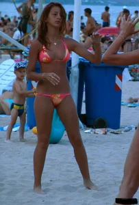 A bunch of sexy beach voyeur babes in bikinis, thongs and topless