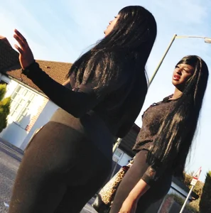 2 sexy black girls in leggings with nice asses