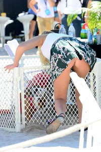 Girl in a Skirt and Sandals Bending Over Street Candid Upskirt Photos