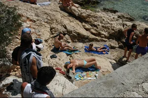 Nude girls on a beach in Hvar, Croatia