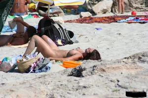Bunch of sexy ladies on a nude beach