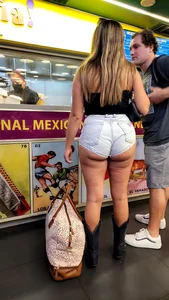 Big Ass Cheeks showing in tiny shorts in cowboy boots