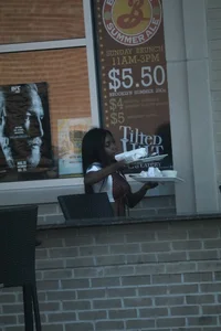 Sexy ebony Tilted Kilt employee in her uniform