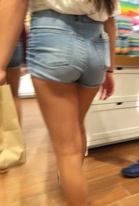 Perfectly Hot Ass in Jeans Shorts and Nice Long Legs at the Shop Creepshot