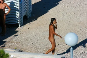 FKK Nudists playing in the water with floater