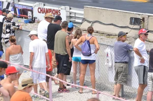 Skinny babe with a cute little ass in tiny blue shorts